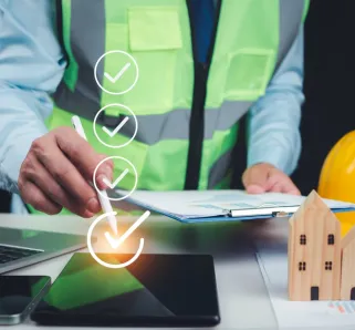 Validation of construction project inspection and approved building permits, with an architect or engineer reviewing documents and authorizing a residential building project.