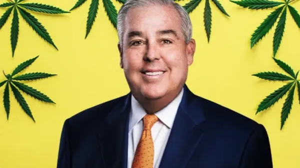 john morgan with weed icons in the back