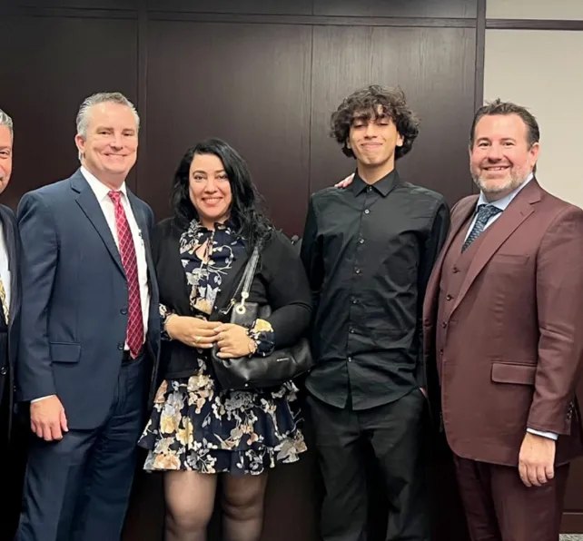 morgan and morgan attorneys with client at trial