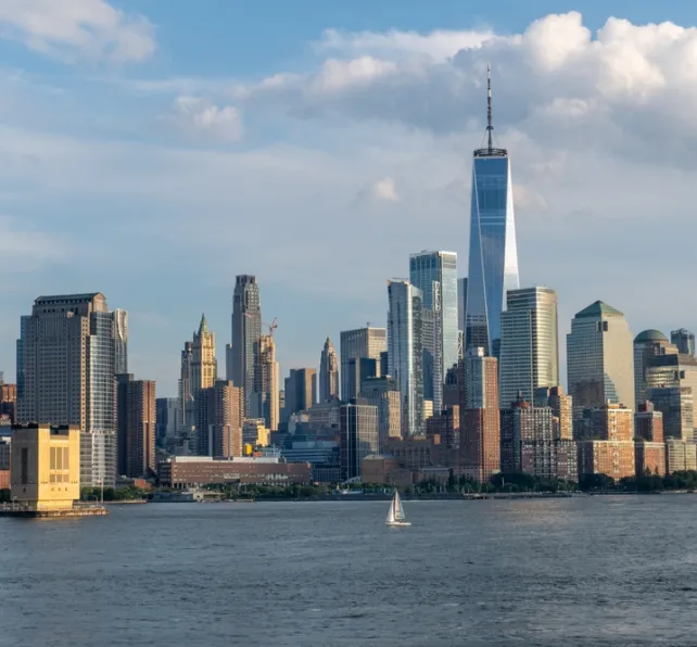 New York City skyline as seen from the Hudson River. Lower Manhattan with One World Trade Center as tallest building in the western hemisphere