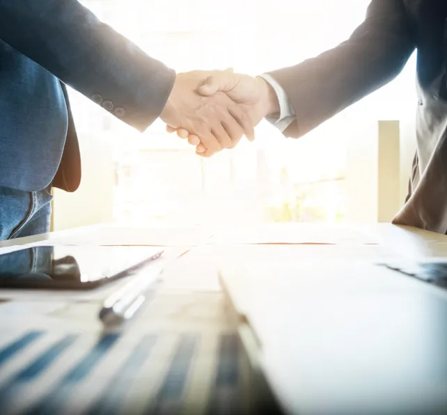 Morgan & Morgan Acquires Law Firm Alley, Clarke & Greiwe; Adding Leading Personal Injury Attorneys to Tampa Office - Colleagues are shaking hands