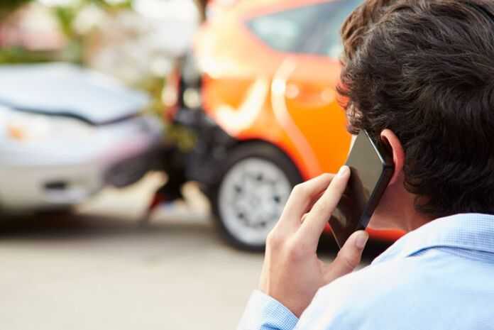 What Should I Do After a Car Crash in Nashville - person calling for help after car accident