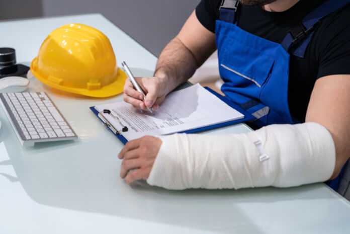 Social Security Disability Lawyers in Charleston - Construction Worker filling Social Security Disability Forms
