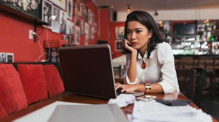 business owner looking at computer