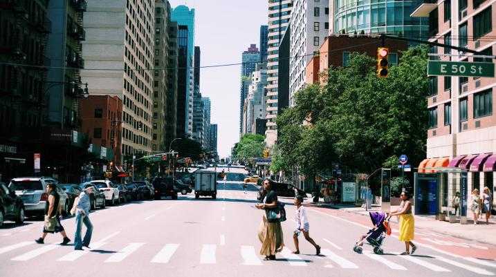 pedestrian walking across the street