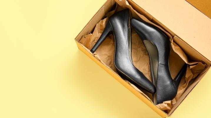 Black high heels in a box - Risks and injuries from high heels, Morgan & Morgan legal help.