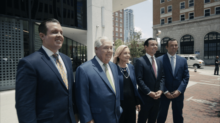 Image of the Morgan Family outside the Morgan & Morgan Orlando office