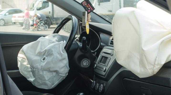 Car airbag deployment during collision