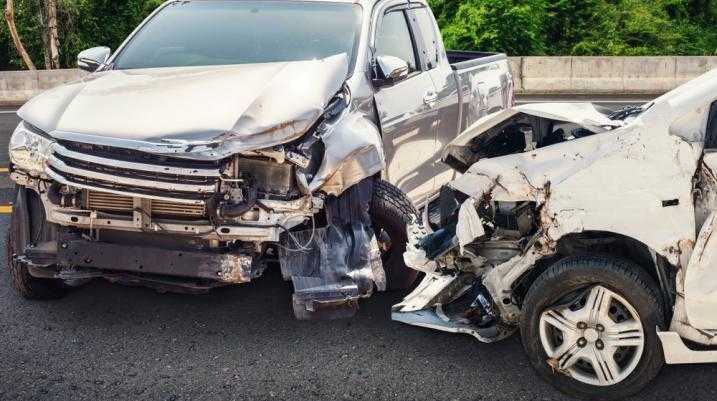 Truck and car damaged after an accident