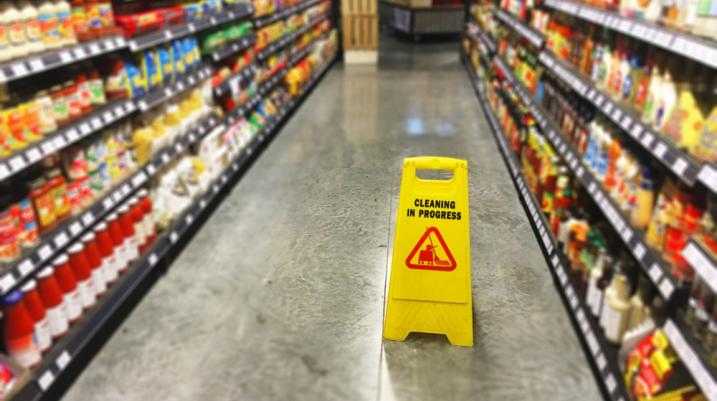 Grocery store with a caution sign