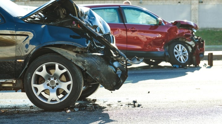 Two damaged cars after an accident on the street