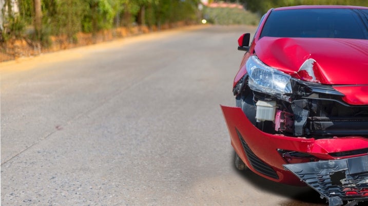 Red car damaged after an accident