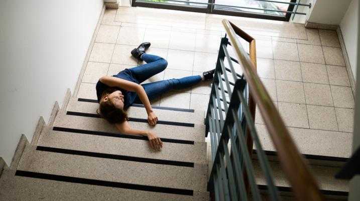 Woman fallen down the stairs