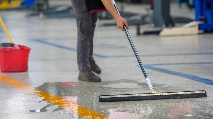 Man cleaning the floors