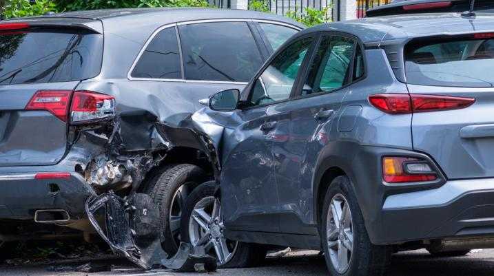 Two grey SUVs crashed into each other