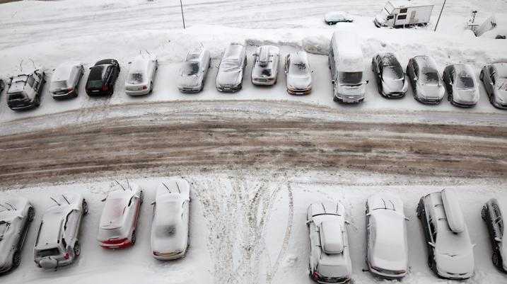 Cars in a snowy parking lot