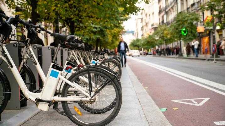 Row of e-bikes on a city street