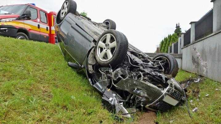 Car flipped over in a ditch