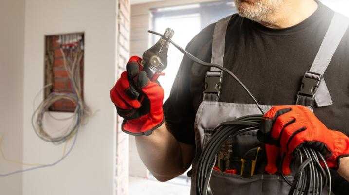 Electrician working in a home