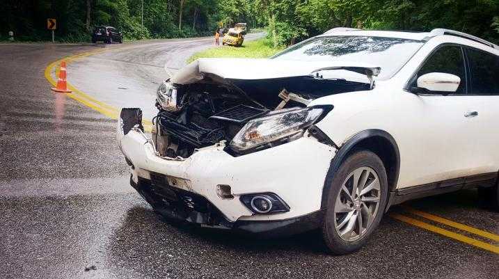 White car after an accident on a road