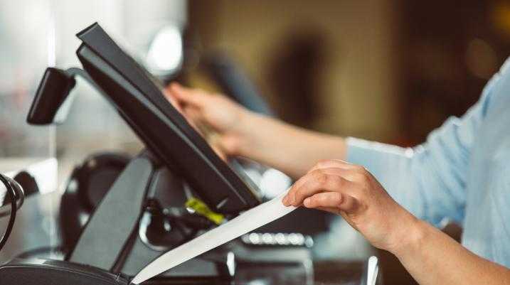 Cashier getting a receipt 