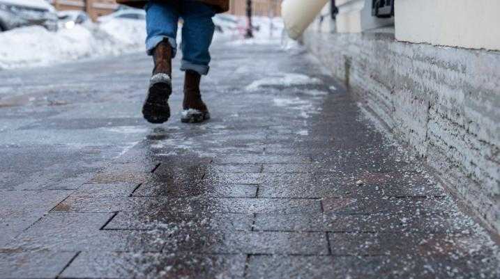 Someone walking on an icy sidewalk