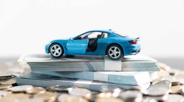 blue car on top of cash