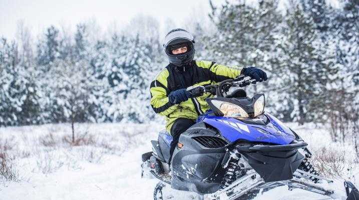 Man riding a snowmobile