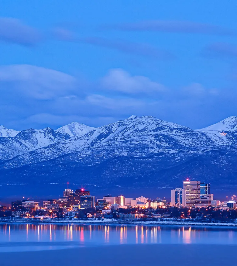 Snowy mountains and city