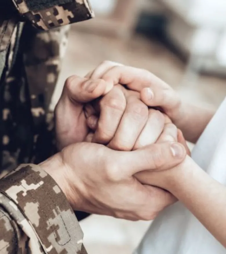 Florida's Department of Veterans Affairs - Veteran holding hands with family member