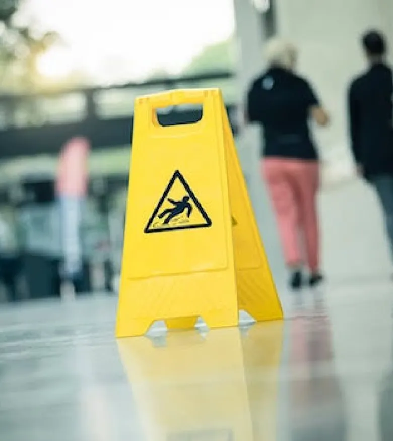 Best MTA Transportation Lawyer in NYC - slip and fall sign in the subway station