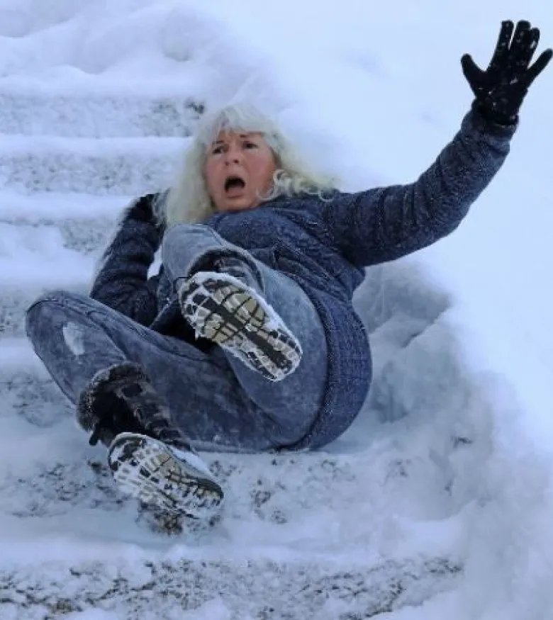 Slip and Fall Accident on Apartment Stairs in NYC - lady laying on the stairs