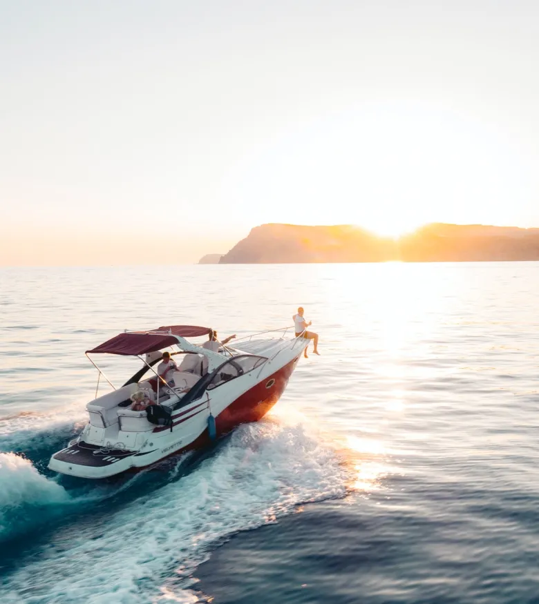 Daytona Beach Maritime Attorneys - boat on the water with sunset