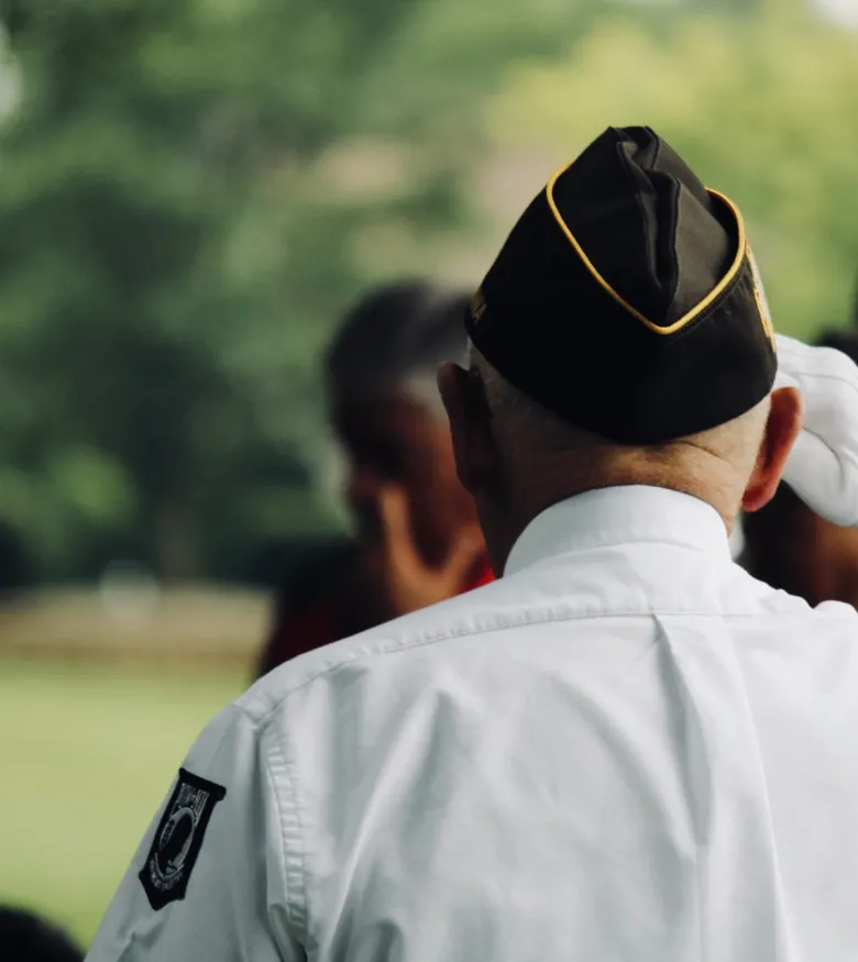 Fort Myers Veterans' Benefits Attorneys - veteran man saluting to the flag