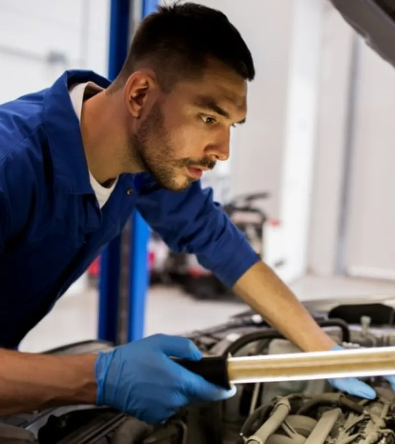 Atlanta Car Repair Injury - Man fixing vehicle