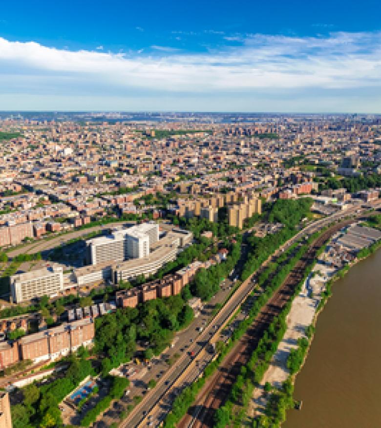 Aerial view of the Bronx's dense urban area, a busy setting for personal injury lawyers to offer their services.