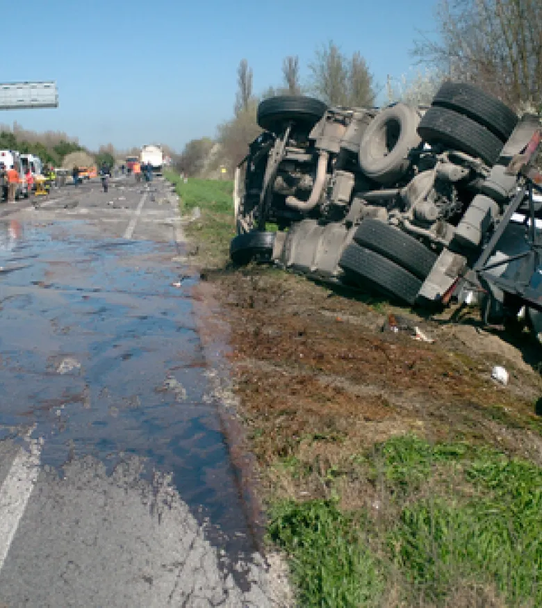 Truck tipped over on a wet road, consult a truck accident attorney in Cheyenne.