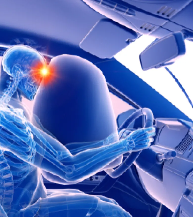 An X-ray depiction of a skeleton in a car showing the impact of an airbag during a collision, illustrating Airbag Injuries in Waltham.