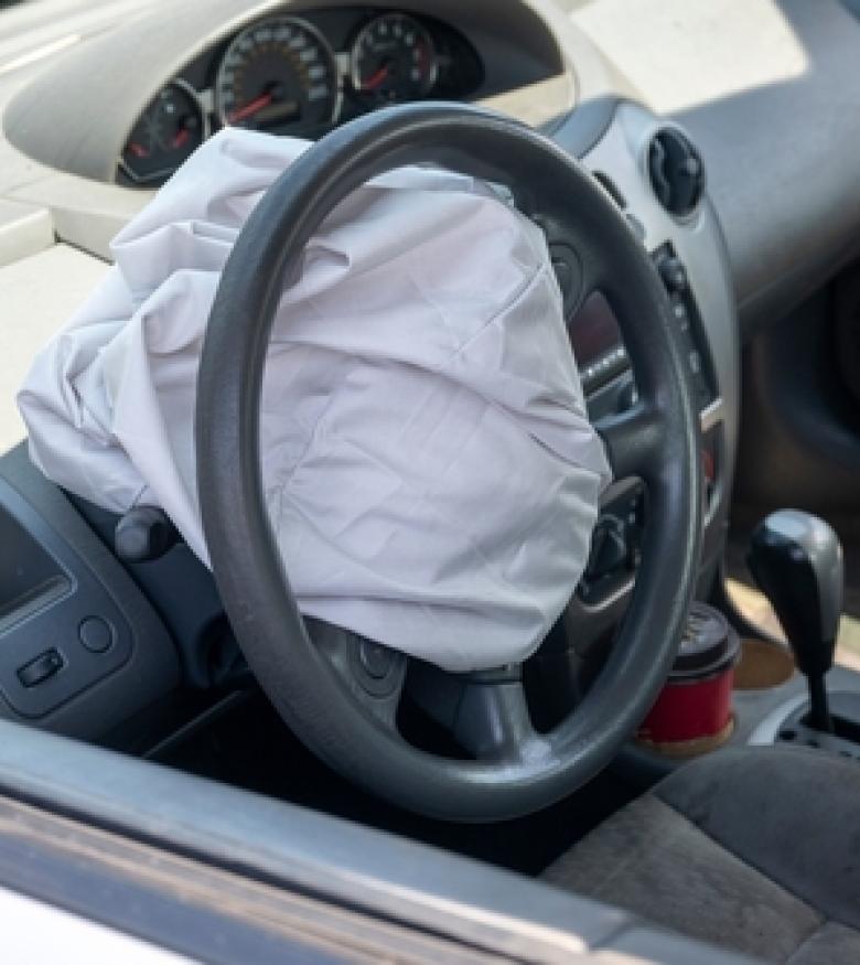 Deployed airbags in a car interior, highlighting the need for legal assistance with Airbag Injuries in Gainesville.