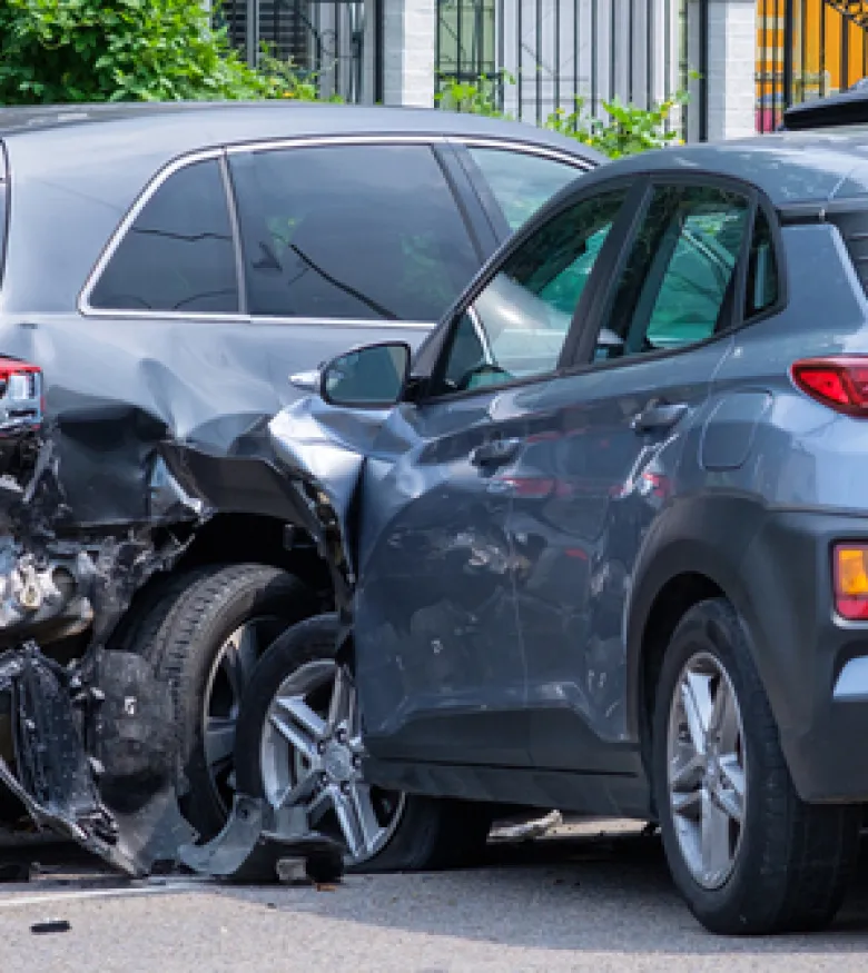 Two cars involved in a collision, highlighting the need for a car wreck lawyer in Brunswick.