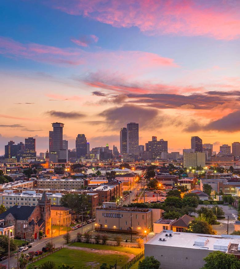 Sunset over New Orleans, vibrant cityscape for personal injury lawyers.