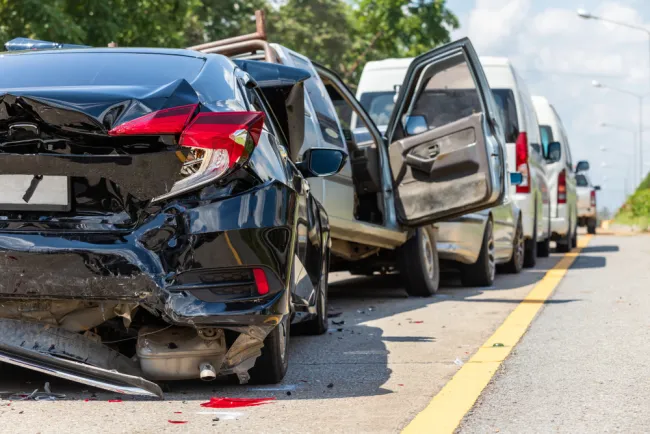 Small back car damaged after being rear ended