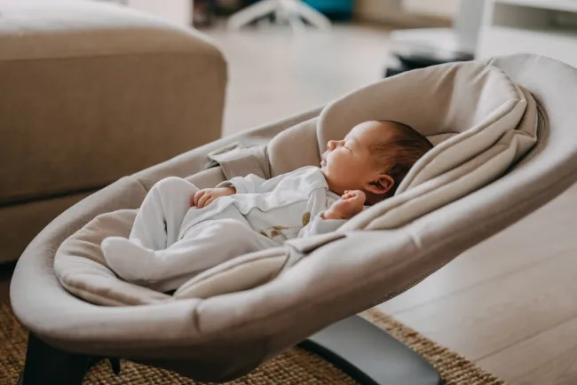 baby in a baby swing