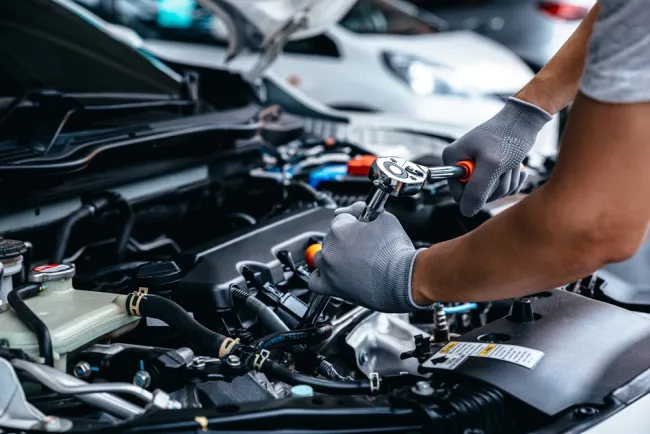 Mechanic fixing a car