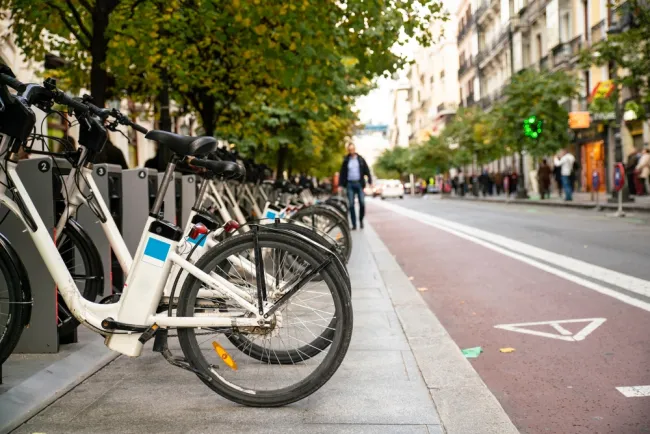 Row of e-bikes on a city street