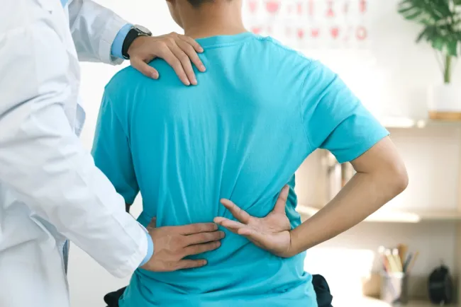 Man getting a chiropractic adjustment