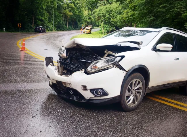 White car after an accident on a road