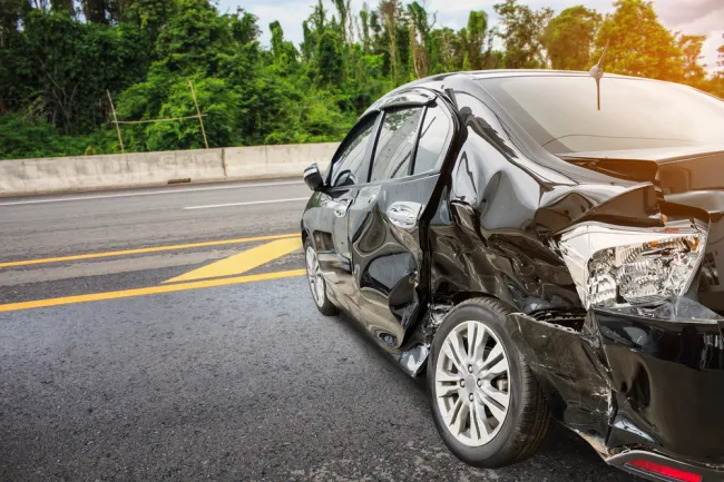 Damaged back car on the street