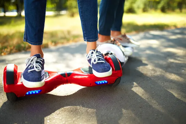 Consumer Alert: Hoverboards Can Cause Serious Injuries or Catch Fire - stepping on hoverboards