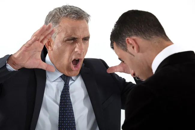 Workplace Retaliation: The Most Common Forms You Should be Aware of - boss yelling at employee